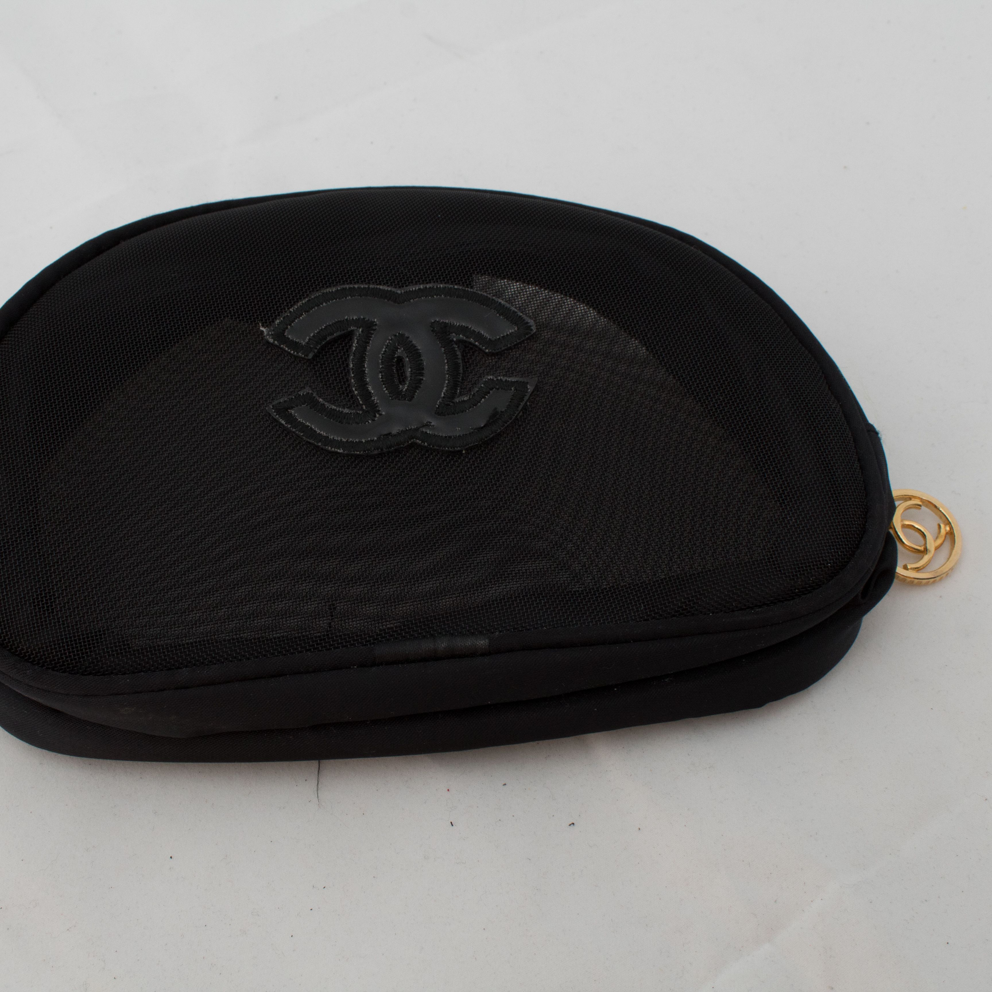 Chanel Mesh Makeup Bag by Dana Boulos Basic.Space