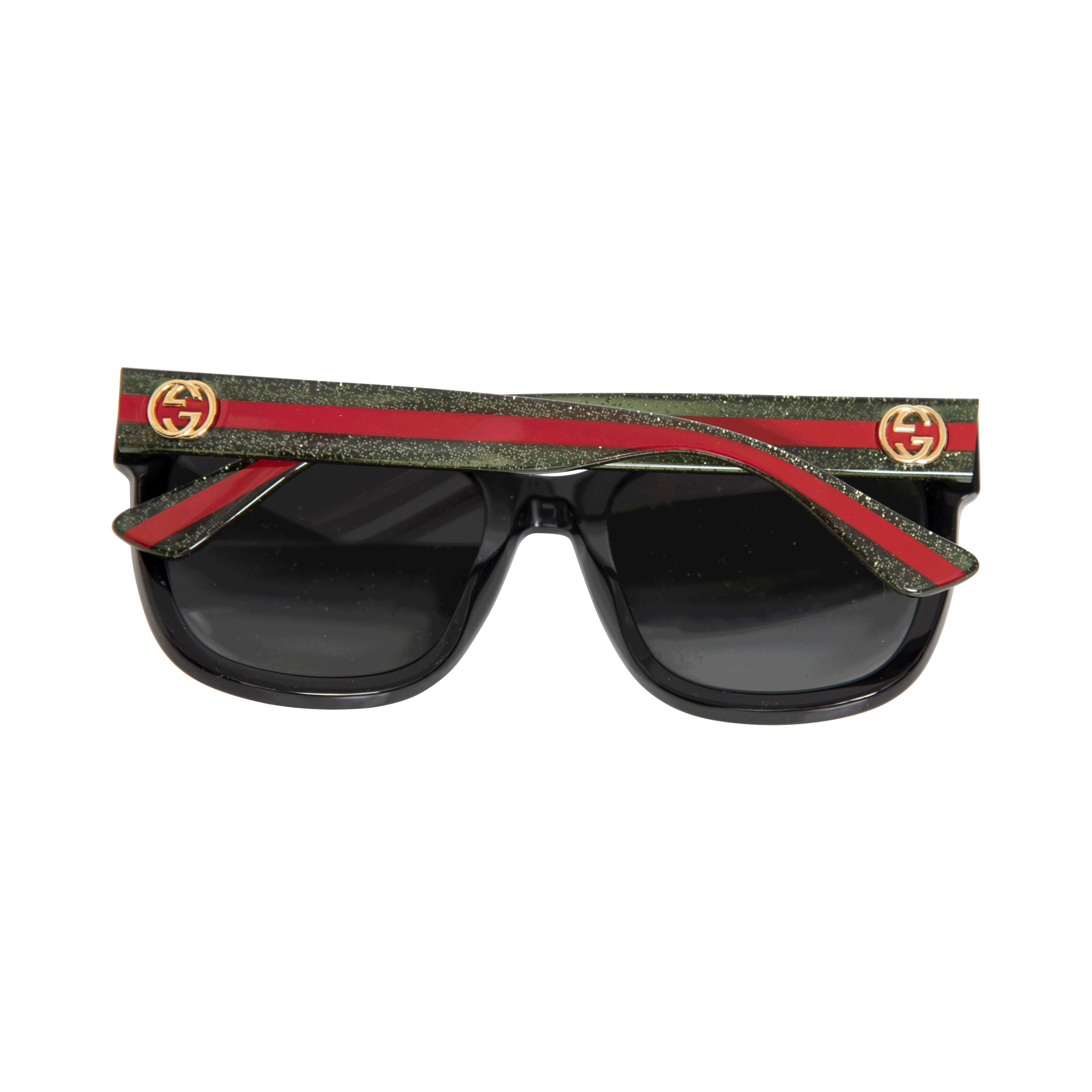 Red and Green Gucci Sunglasses by Erin Eliopulos Basic.Space